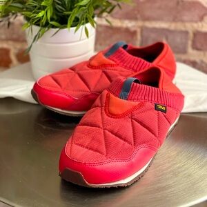 SNEAKERS: Slip-on coral-colored Teva shoes. Size 9.